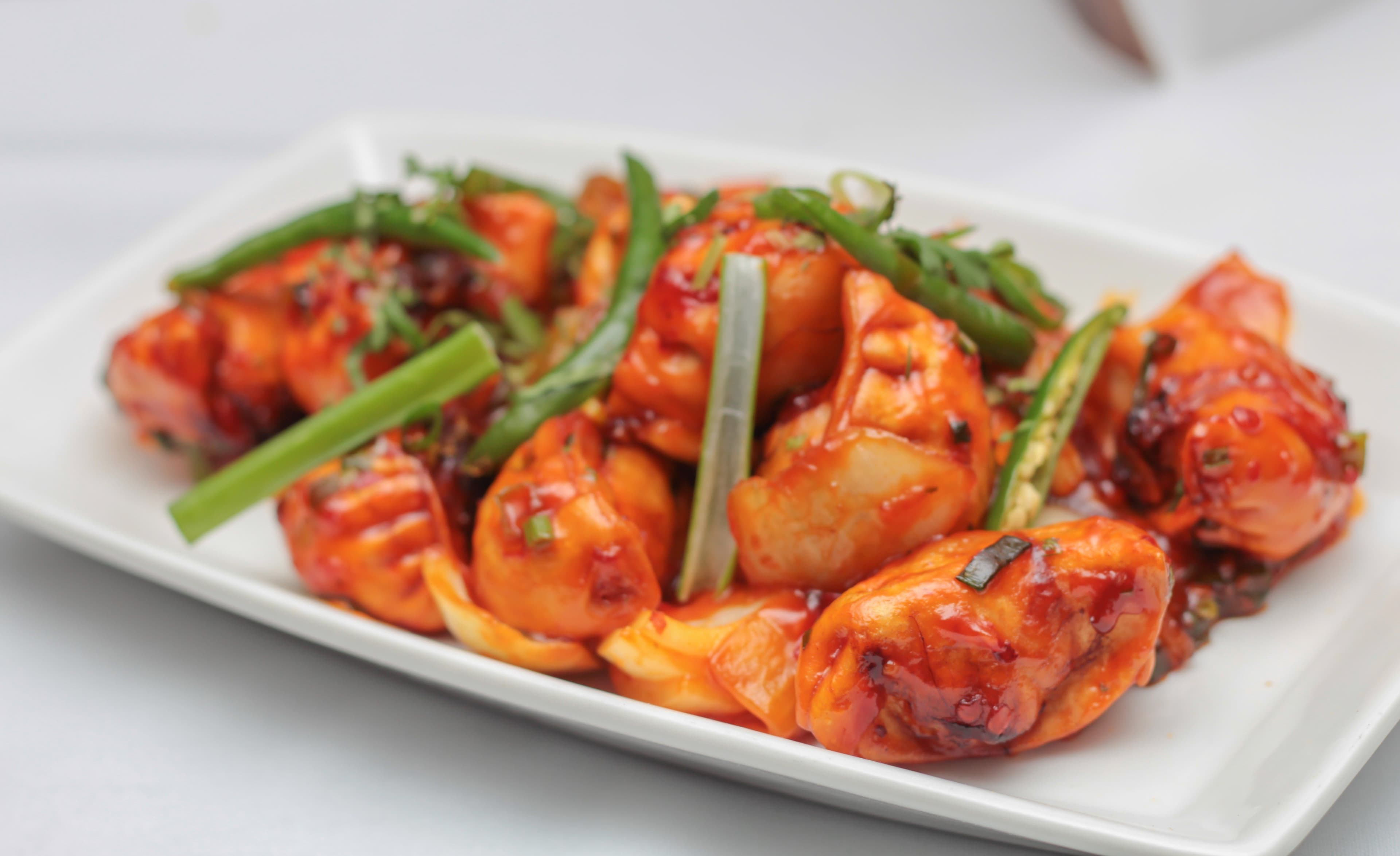 C-Momo - Momos in spicy and tangy chutney with unique fusion flavors